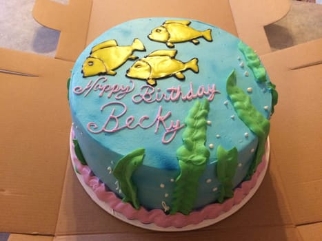 Happy Birthday Becky Cake with Fish Swimming Underwater. High quality photo