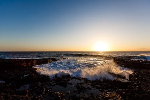 quiet sea coast with stones at the twilight, natural sea background