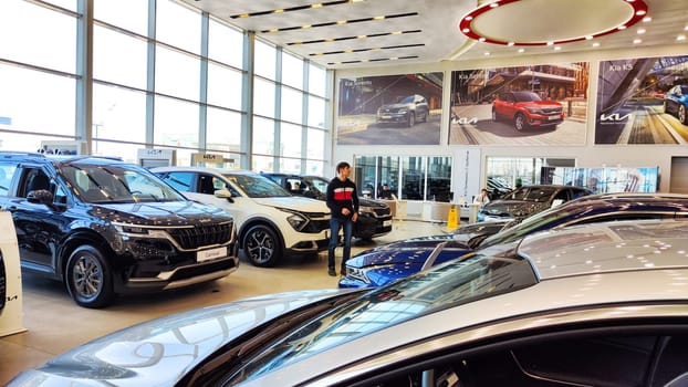 Kazan, Russia - April 04, 2023: Cars in showroom of dealership KIA. Re-export to Russia