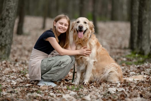Girl In Autumn Park With Golden Retriever Enjoys Peaceful Afternoon