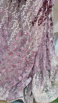 wedding dress, beautiful lace, purple hem fabric. High quality photo