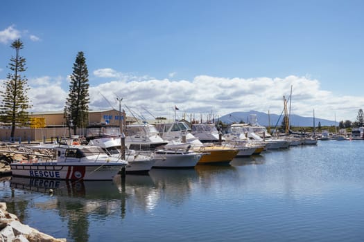 BERMAGUI, AUSTRALIA - April 3 2024: Bermagui Wharf and Marina on the Bermagui River in Bega Shire, New South Wales, Australia