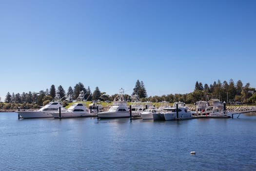 BERMAGUI, AUSTRALIA - April 3 2024: Bermagui Wharf and Marina on the Bermagui River in Bega Shire, New South Wales, Australia