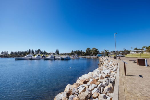 BERMAGUI, AUSTRALIA - April 3 2024: Bermagui Wharf and Marina on the Bermagui River in Bega Shire, New South Wales, Australia