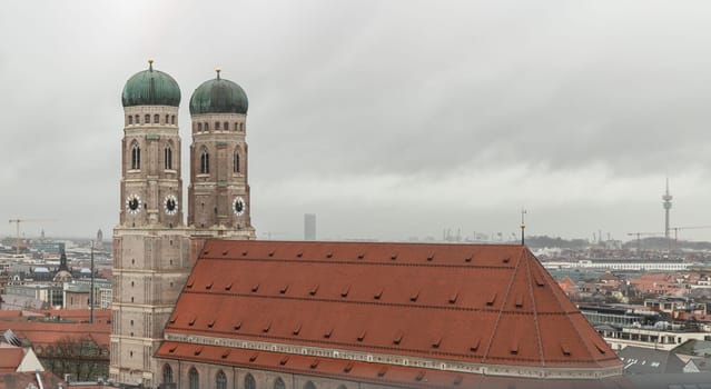 Munich, Germany - Dec 22, 2023 - Aerial view of Frauenkirche or Cathedral of Our Dear Lady is a catholic church in Munich, Bavaria in Germany. Space for text, Selective focus.