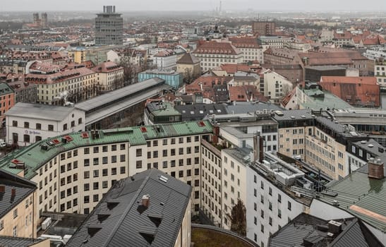 Munich, Germany - Dec 22, 2023 - General aerial view of Munich from a tower. Cityscape of Munich city downtown, Space for text, Selective focus.