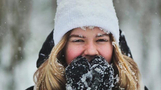 A young girl freezes in the woods in winter