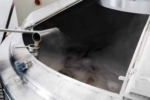 sampling in the process of brewing beer at the beer production plant