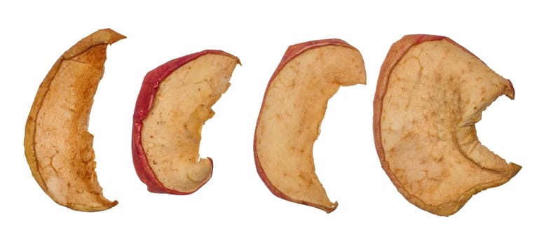 Dried apple slices on isolated background, top view