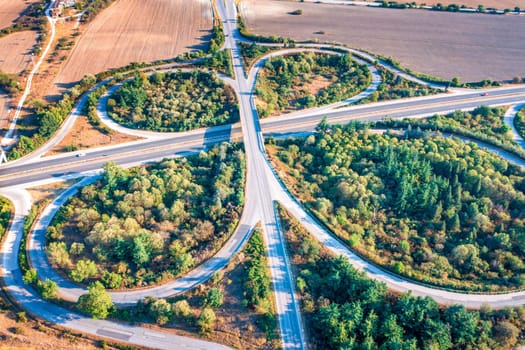 Aerial view from a drone of a road junction. Transportation and infrastructure concept