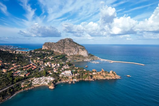 Aerial view of a bay and big rock near Cefalu, Sicily, Italy.