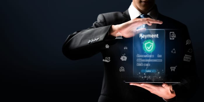 Business person initiates an online payment transaction, showcasing secure and efficient methods. Learn the best practices for safe online payment transactions. FaaS