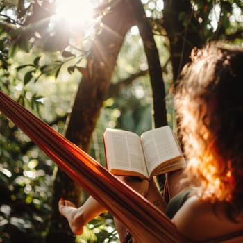 Relaxing in a hammock, surrounded by the tranquil landscape of trees and grass, a person enjoys leisurely reading a book under the shade of a terrestrial plant AIG50