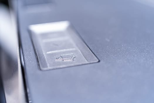 Denver, Colorado, USA-May 5, 2024-This image captures a close-up view of the control buttons used for operating the tailgate and tonneau cover of a Tesla Cybertruck, highlighting the futuristic and functional design elements.