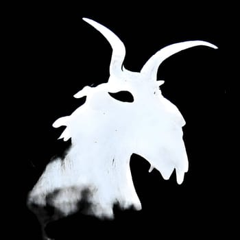 Vector illustration of a goat in white silhouette against a clean black background, capturing graceful forms.