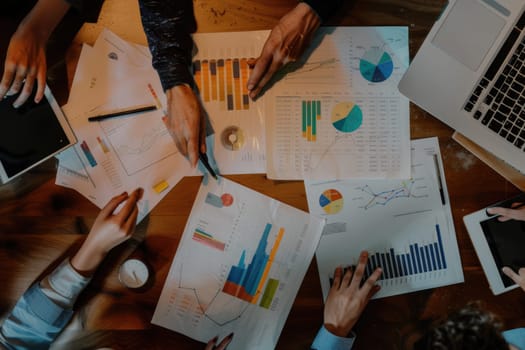 Close up of group of professional business people hands looking at financial plan. Top view of marketing team and project manager discussing and brainstorming idea while planning by paper. AIG42.