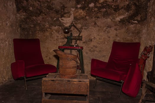 Old wine cellar with vintage wine bottles