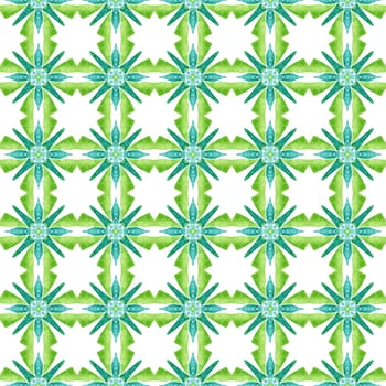 Textile ready decent print, swimwear fabric, wallpaper, wrapping. Green powerful boho chic summer design. Ikat repeating swimwear design. Watercolor ikat repeating tile border.