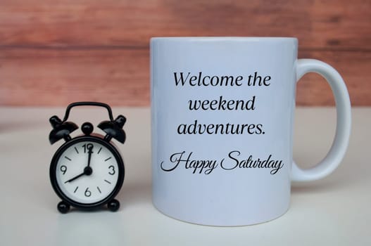 Welcome the weekend adventures. Happy Saturday. Morning greetings concept
