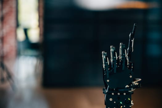 Black real robot hand illustrates futuristic design pressing on a table. Signifying artificial intelligence evolution and technological innovation in advanced robotics.