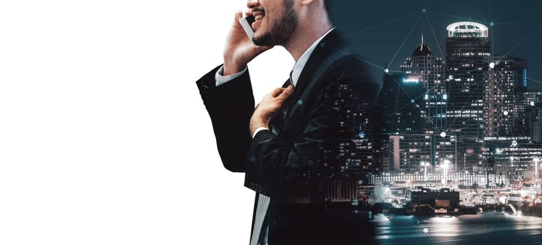 Double Exposure Image of Business Communication Network Technology Concept - Business people using smartphone or mobile phone device on modern cityscape background. uds