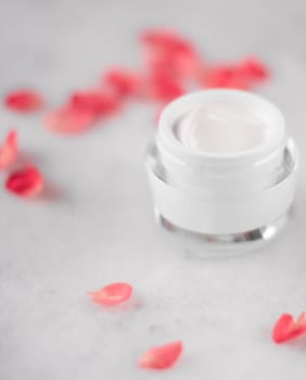 luxe face cream and rose petals - cosmetics with flowers styled beauty concept, elegant visuals