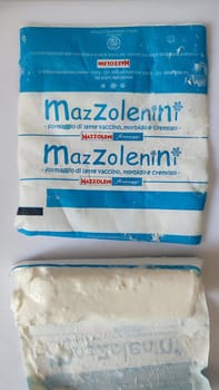 2 April 2024 Milan , Italy, packaged white cheese, Italian manufacturer, brand. High quality photo