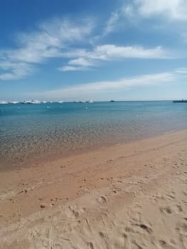 Beach Relaxation at the Red Sea. Fairy-tale Moments of a Sunny Day. The concept of tourism and sea travel.