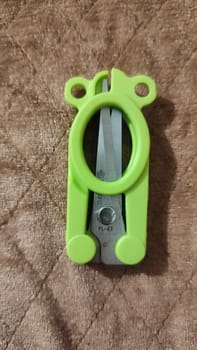 small folding travel scissors object. High quality photo