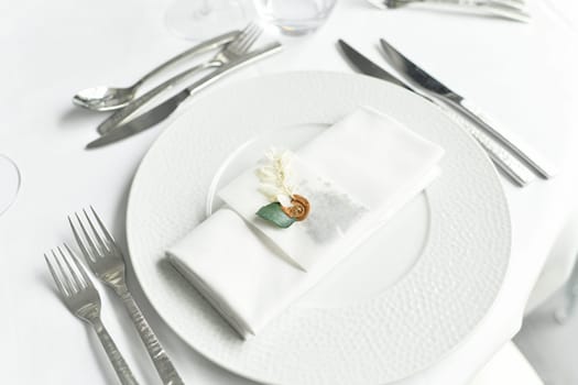 Table setting with cutlery and napkin