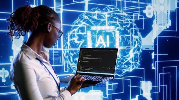Knowledgeable IT consultant programming scripts on laptop, employing AI machine learning. Computer science practitioner manipulating lines of code for artificial intelligence applications development