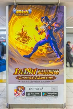 tokyo, japan - jan 16 2024: Smartphone RPG game 'Legend of Justice' poster dedicated to the Japanese manga and anime 'Knights of the Zodiac: Saint Seiya' with Phoenix Ikki and Virgo Shaka Gold Saint.