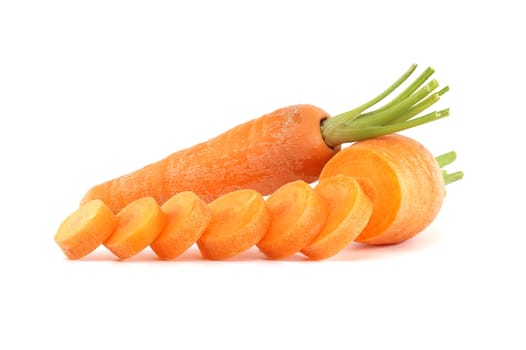 Whole carrot alongside its sliced pieces, each exhibiting a vibrant orange hue, set against a white background
