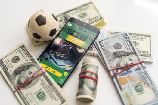 soccer ball over a lot of money. corruption football game. Betting and gambling concept. wold cup. High quality photo