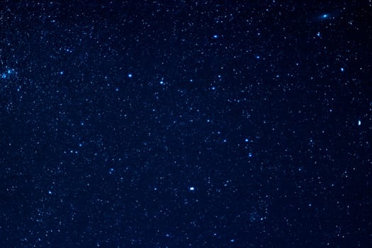 abstract background with a starry dark blue night sky