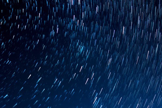 tracks from the stars against the dark night sky