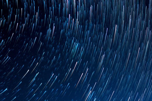 tracks from the stars against the dark night sky