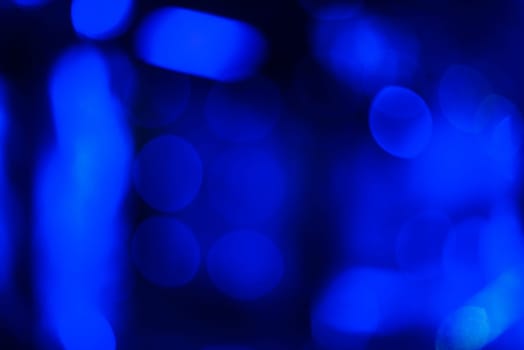 blue background with abstract blurred circular bokeh