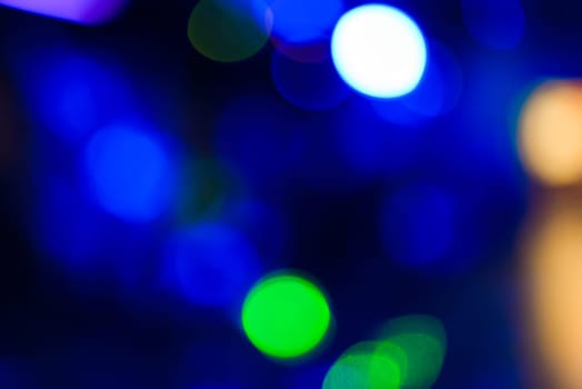 blurred colorful background with round glowing bokeh