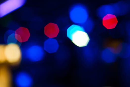 color blurred background with a red and blue glowing bokeh