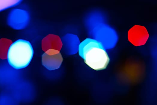 color blurred background with bright glowing festive bokeh