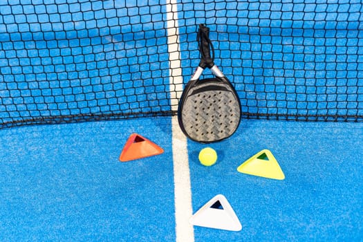 Paddle tennis objects and court. High quality photo