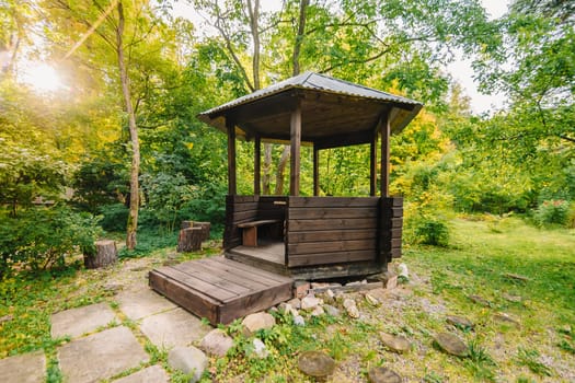 relaxing gazebo in the Park among the trees in summer