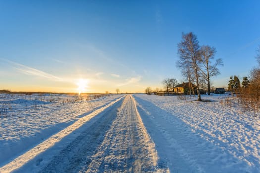 house in the village on a frosty Sunny day in winter