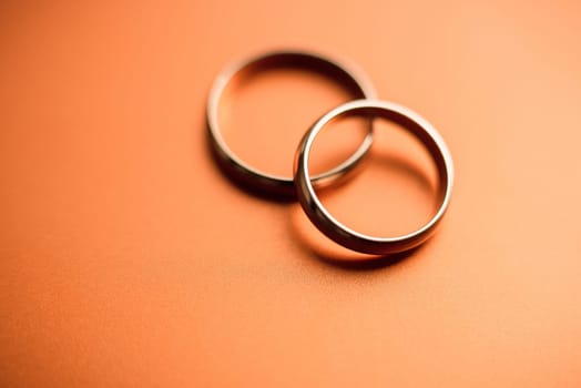 pair of gold wedding rings close-up for a wedding ceremony