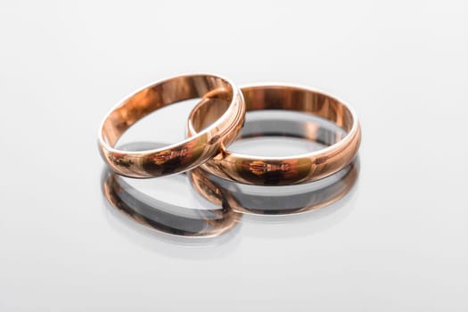 pair of gold wedding rings close-up for a wedding ceremony