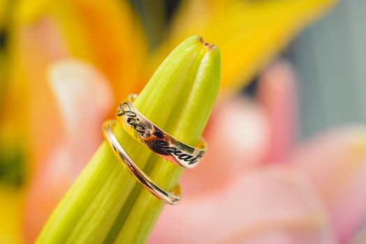 pair of gold wedding rings close-up for a wedding ceremony