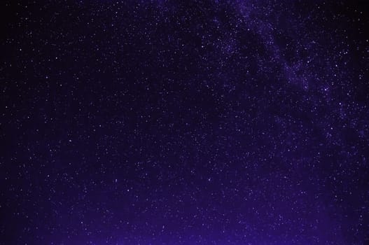 stars on the night purple black starry sky with the milky way