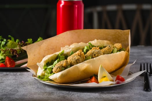 Deep fried mussels in bread and with greens on the side. Turkish name Midye Tava