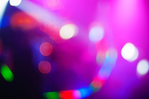pink colored background with bright abstract blurred spots